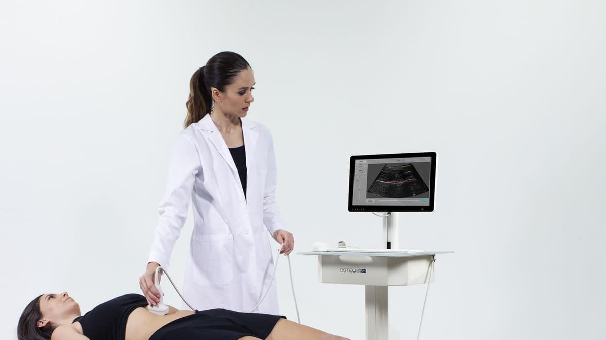 Healthcare professional performing a REMS ultrasound bone scan